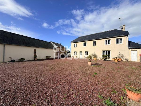 A Vendre, ensemble immobilier : maison d'habitation, dépendance et hangar.
