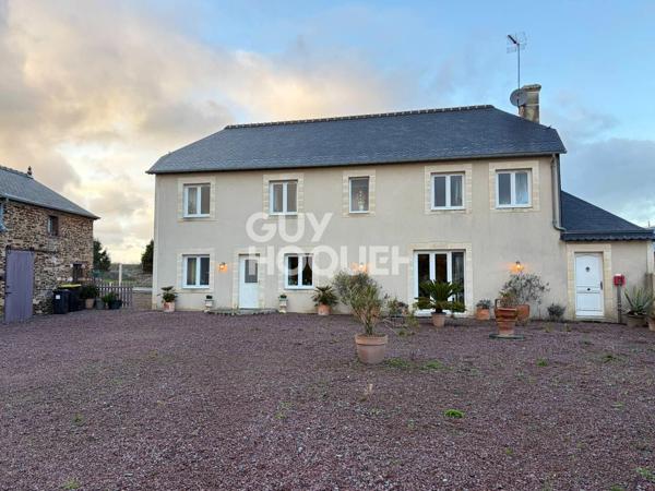 A Vendre, ensemble immobilier : maison d'habitation, dépendance et hangar.