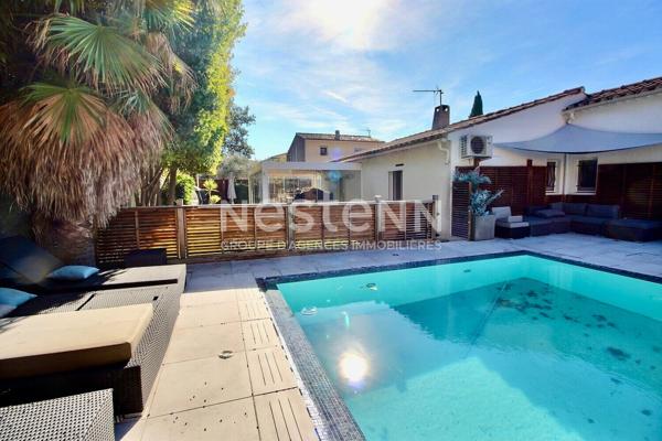 Maison de type 4 d'environ 126m² avec véranda, jardin, piscine et garage