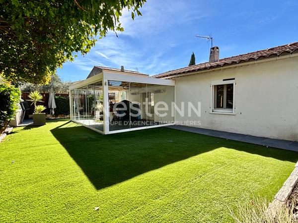 Maison de type 4 d'environ 126m² avec véranda, jardin, piscine et garage