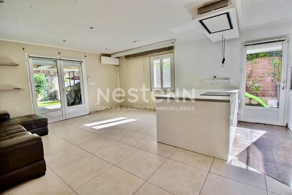 Maison de type 4 d'environ 126m² avec véranda, jardin, piscine et garage