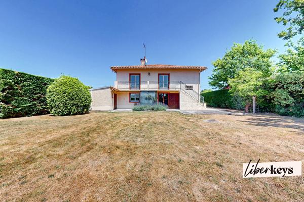 Maison avec grand terrain et double garage