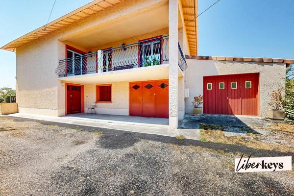 Maison avec grand terrain et double garage