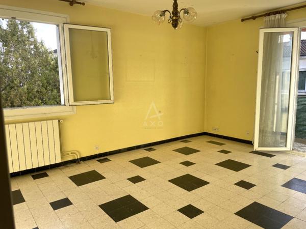 Appartement T3 avec grand balcon, garage et cave