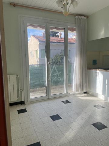 Appartement T3 avec grand balcon, garage et cave