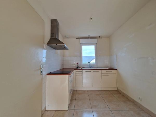 Maison de 80 m², 4 pièces dont 3 chambres, garage et jardin sur terrain de 418 m².