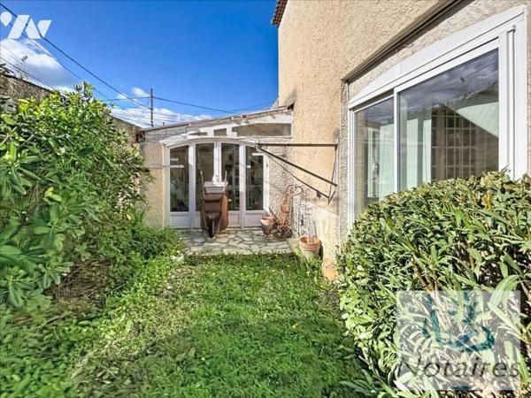 Maison avec jardin et garage proche centre ville