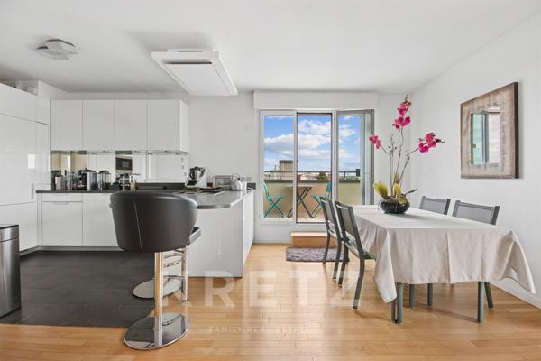 Duplex dernier étage avec terrasse, vue Tour Eiffel et La Défense.