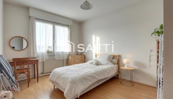 Appartement 4 pièces, 3 chambres, une cave,un box