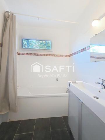 Appartement traversant au sein d'un parc.