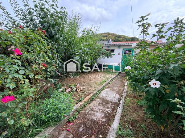 Maison mitoyenne 70m2 2 ch. avec terrasse et jardin