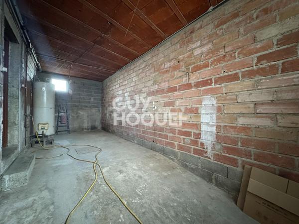 Maison de village avec garage et jardin