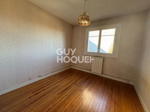 Maison de village avec garage et jardin