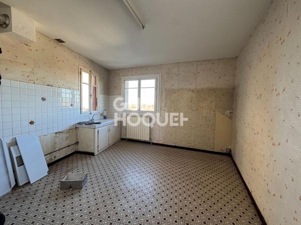 Maison de village avec garage et jardin