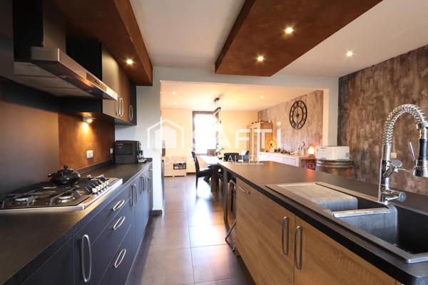 Maison de 145 m² avec garage et terrain