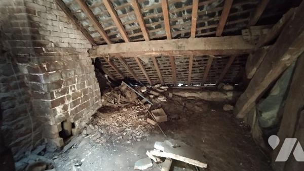 A vendre un immeuble, sur TINCHEBRAY-BOCAGE, comprenant deux logements :