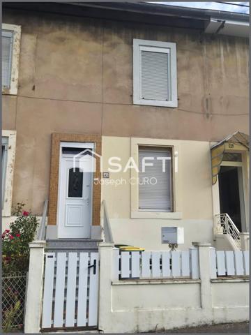 Maison mitoyenne F3,61 m²,terrain 154 m²,2 garages