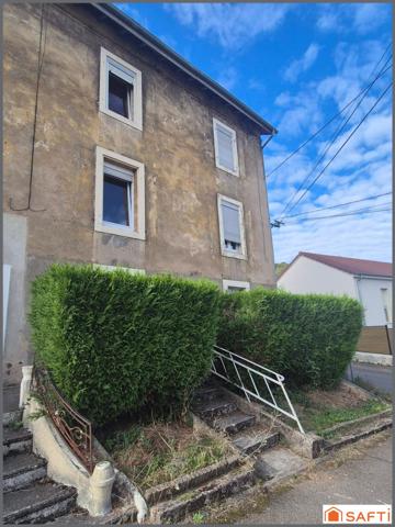 Maison mitoyenne F3,61 m²,terrain 154 m²,2 garages