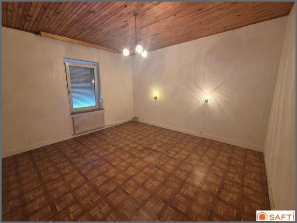 Maison mitoyenne F3,61 m²,terrain 154 m²,2 garages