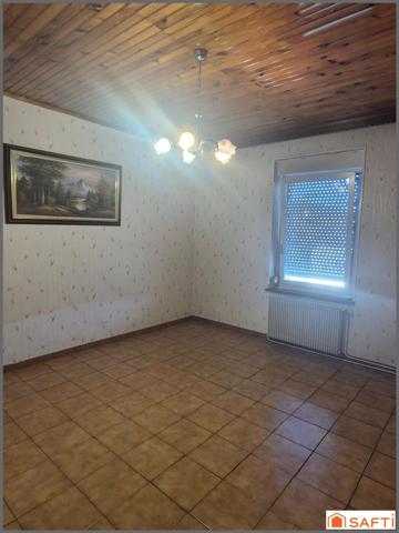 Maison mitoyenne F3,61 m²,terrain 154 m²,2 garages