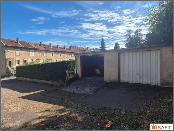 Maison mitoyenne F3,61 m²,terrain 154 m²,2 garages