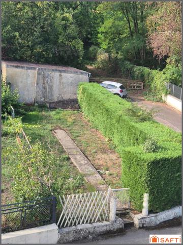 Maison mitoyenne F3,61 m²,terrain 154 m²,2 garages