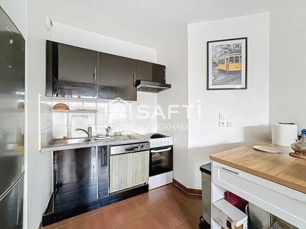 2 pièces en parfait état, proche transports et commerces, jardin privatif