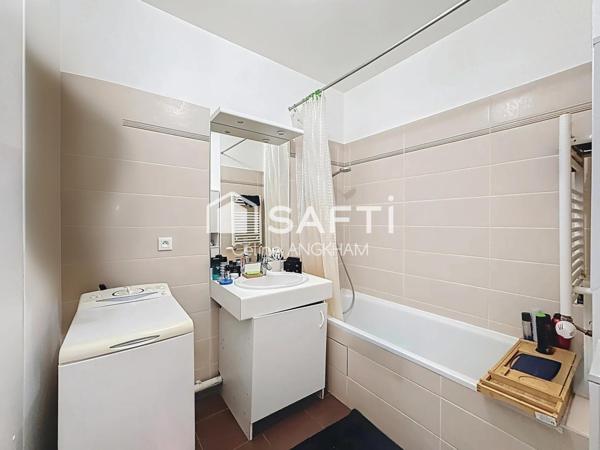 2 pièces en parfait état, proche transports et commerces, jardin privatif