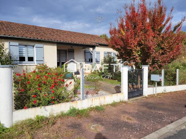 Pavillon rénové avec grande véranda et garage