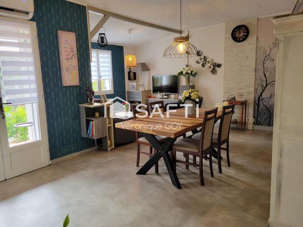 Pavillon rénové avec grande véranda et garage