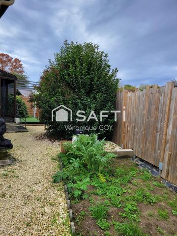 Pavillon rénové avec grande véranda et garage