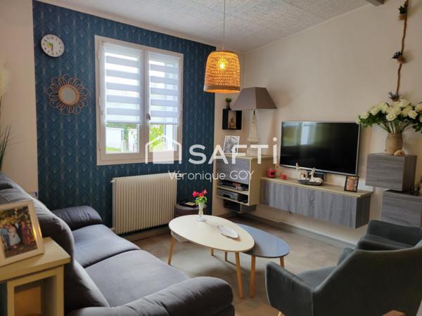 Pavillon rénové avec grande véranda et garage