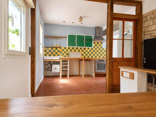 Dijon - Maison familiale avec jardin et garage.