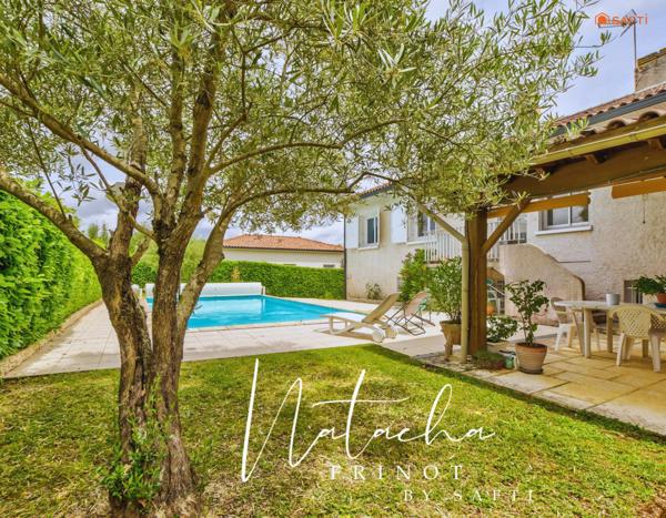 Une maison familiale avec sous-sol complet, jardin arboré et piscine, au cœur de Fronton