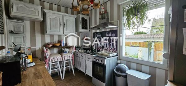 Maison semi mitoyenne - semi plain pied - Jardin - Garage