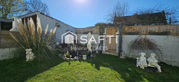 Maison semi mitoyenne - semi plain pied - Jardin - Garage