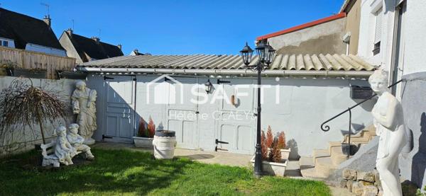 Maison semi mitoyenne - semi plain pied - Jardin - Garage