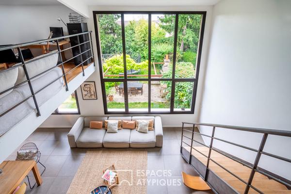 Maison meulière contemporaine avec jardin bucolique