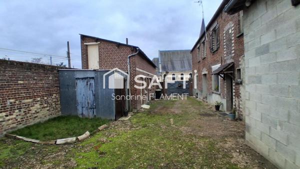 Local garage à vendre avec maison d'habitation