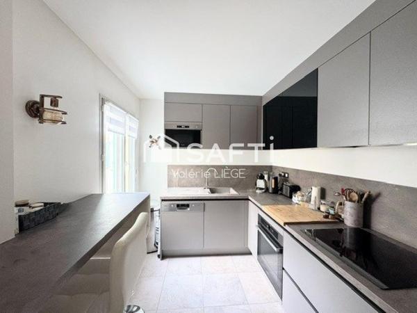 Bien d’exception en duplex au cœur d’une ville prisée