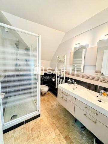 Bien d’exception en duplex au cœur d’une ville prisée