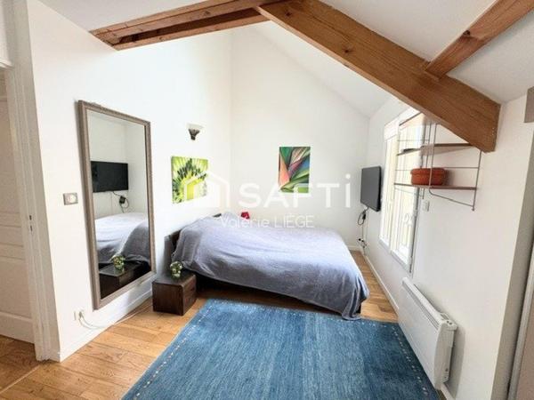 Bien d’exception en duplex au cœur d’une ville prisée