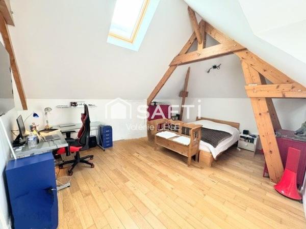 Bien d’exception en duplex au cœur d’une ville prisée