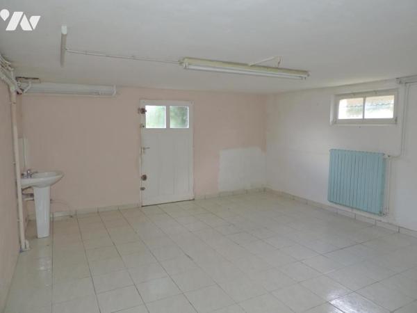 Ensemble immobilier constitué de deux pavillons mitoyens