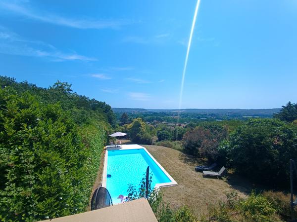 Ancienne grange en pierre d'exception avec vue panoramique, piscine et prestations haut de gamme Neuvic
