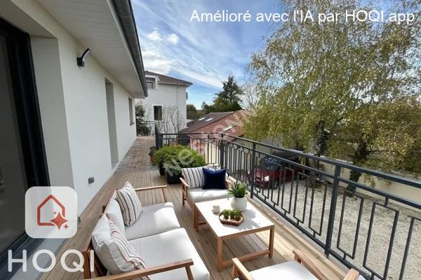 Centre village- Appartement 2 chambres- Balcon- Stationnement