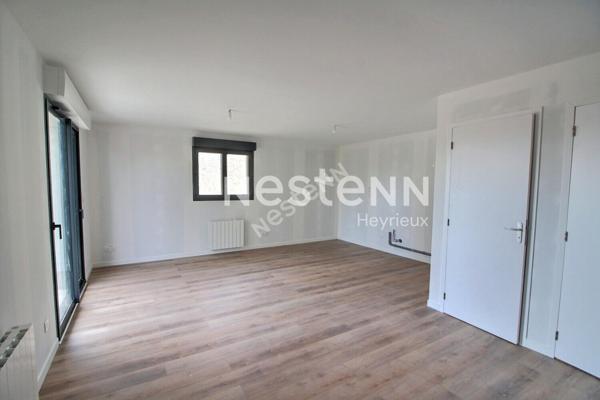 Centre village- Appartement 2 chambres- Balcon- Stationnement