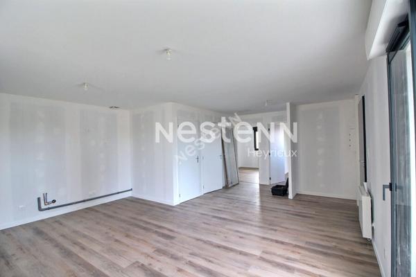 Centre village- Appartement 2 chambres- Balcon- Stationnement