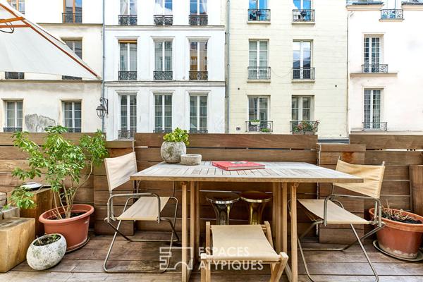 Appartement rénové avec terrasse au coeur du quartier des enfants rouges