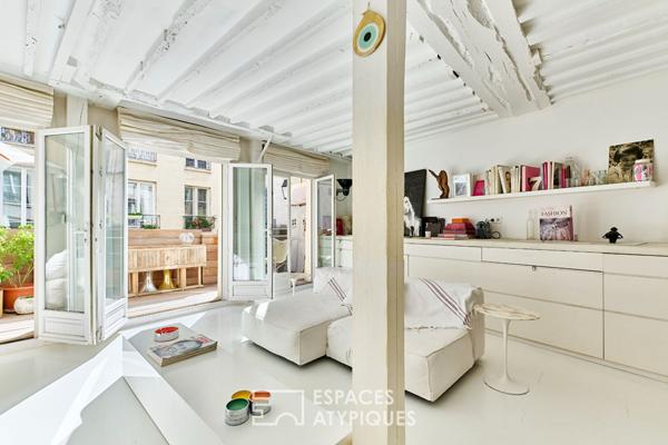 Appartement rénové avec terrasse au coeur du quartier des enfants rouges